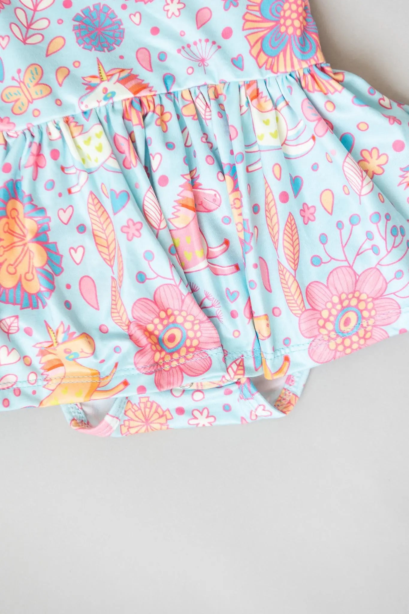 Blue Retro Unicorns Short Sleeve Twirl Bodysuit For Babies Mila & Rose ® Everetts Place: Online Boutique