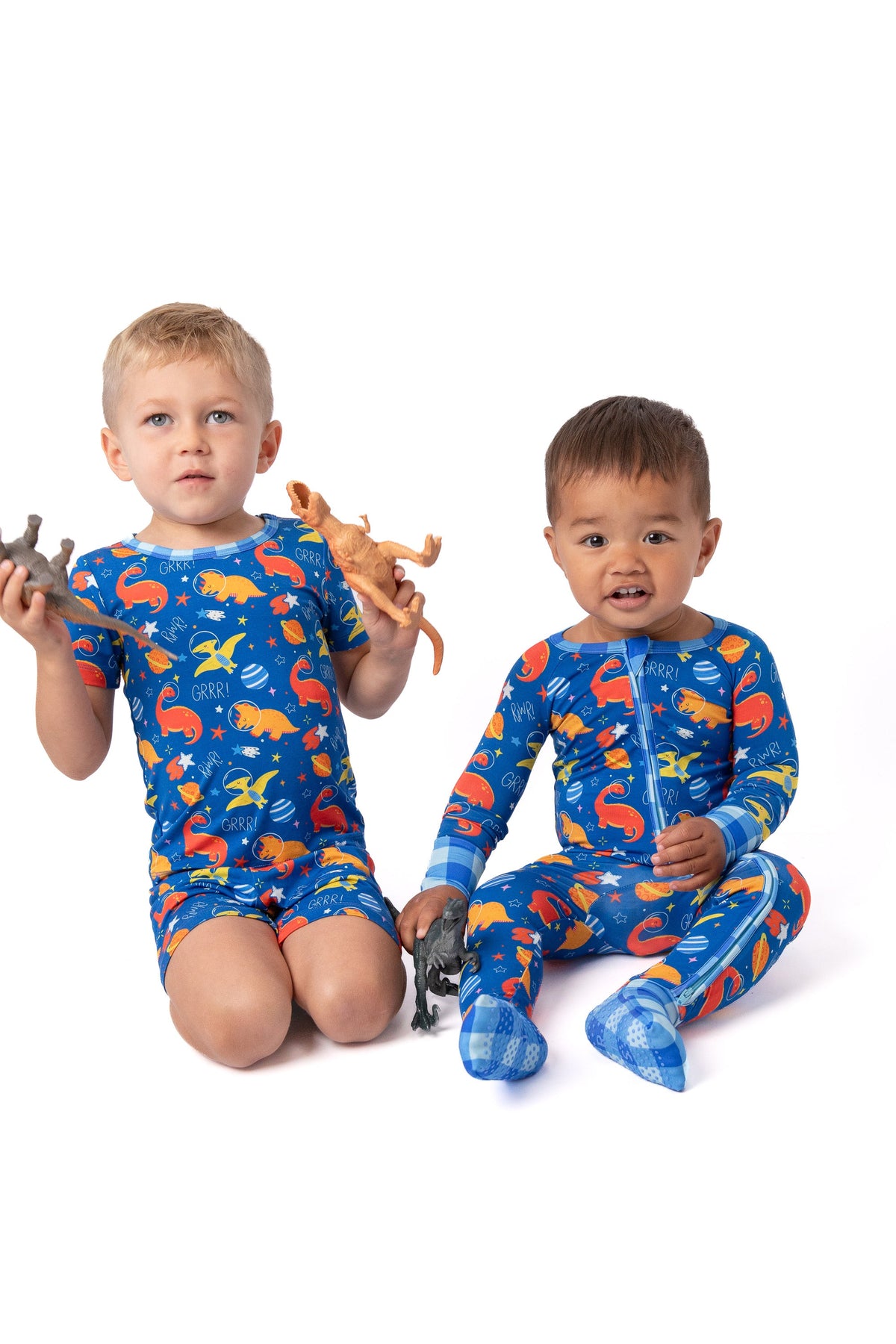Electric Blue Space Dinosaur Bamboo Zip Onesie by Rayn’s Tiny Stitches