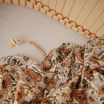 Mushie organic cotton muslin swaddle blanket for baby.