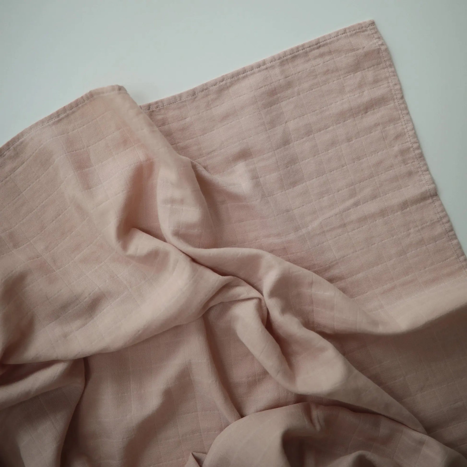 Organic Cotton Muslin Swaddle Blanket for Baby Cuddling and Nursing Mushie