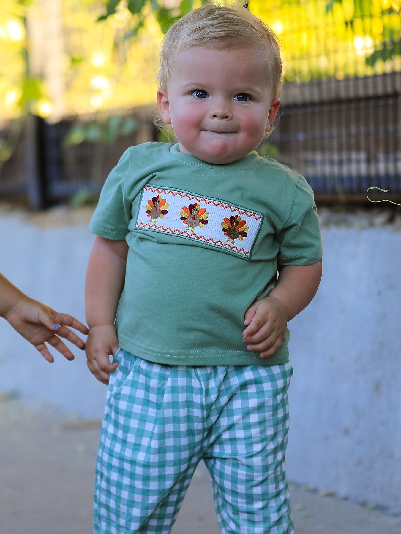 Boys' two-piece set with embroidered Thanksgiving chicken design on a plaid smock top and coordinating pants