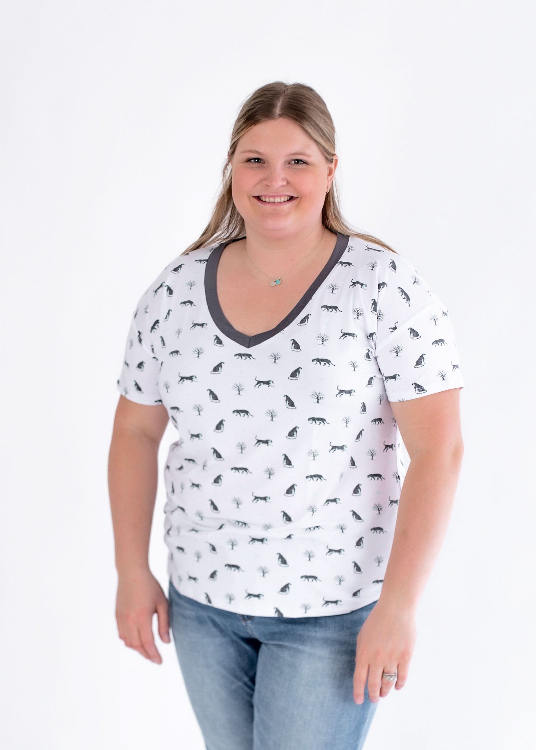 Short sleeve adult V-neck tee in a snow leopard print