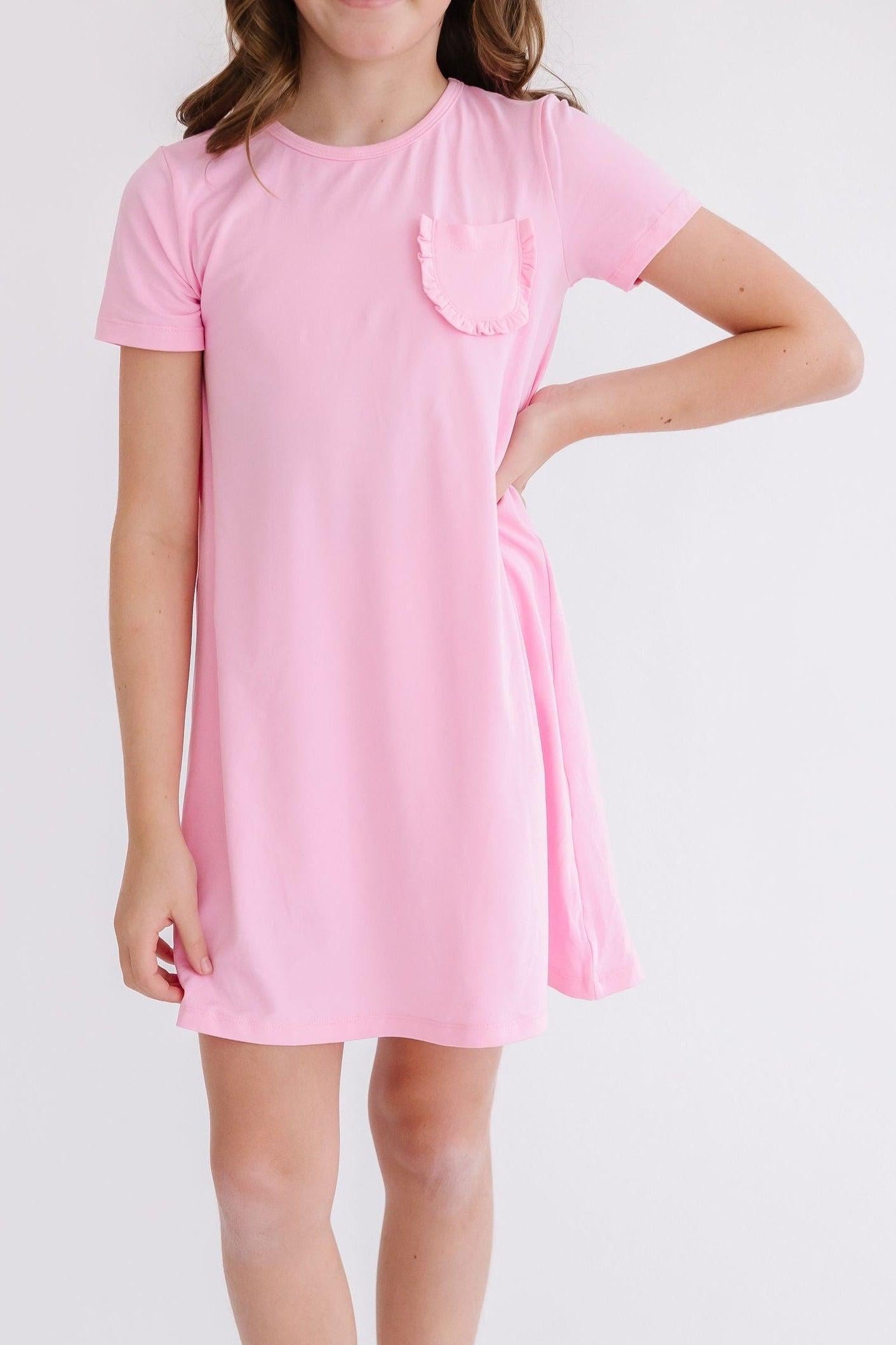 Bubblegum pink t-shirt dress with a ruffle pocket and short sleeves
