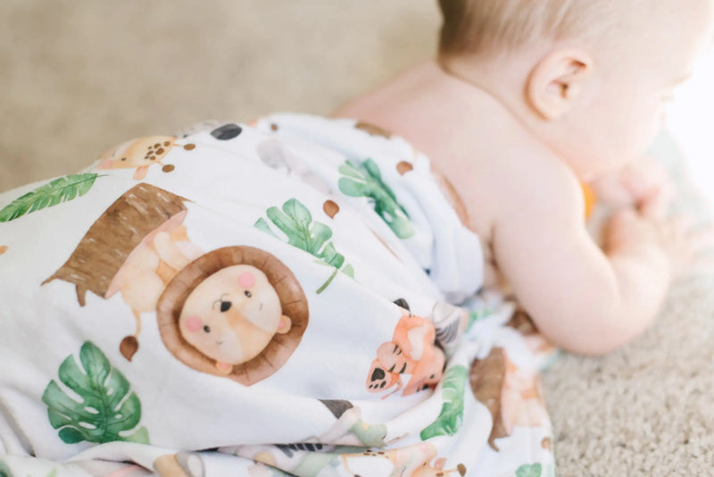 Premium baby and toddler minky blanket with safari pattern and soft texture.