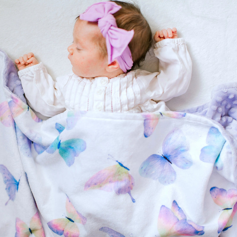 Premium baby and toddler butterfly blanket with vibrant colors, soft polyester, and minky dot texture.