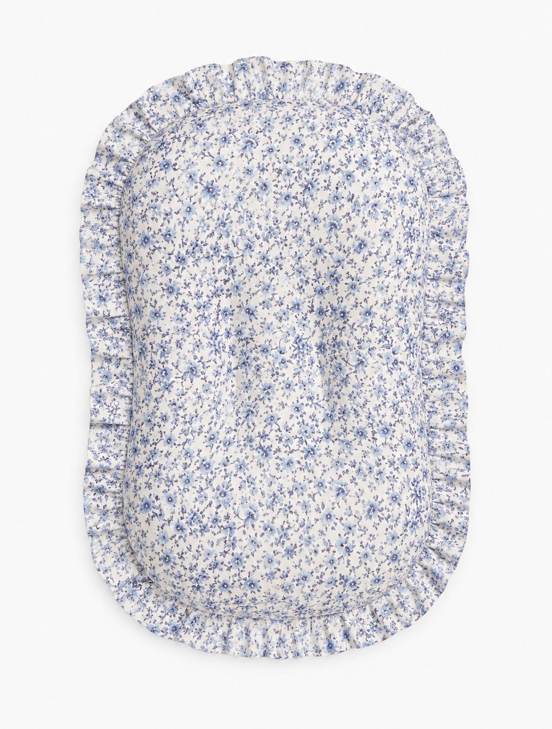 Blue floral baby lounger cover with a ruffle trim along the top edge.