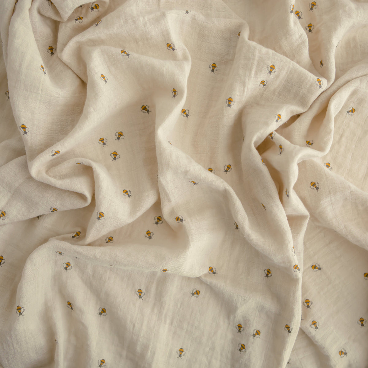 Mushie organic cotton muslin swaddle blanket
