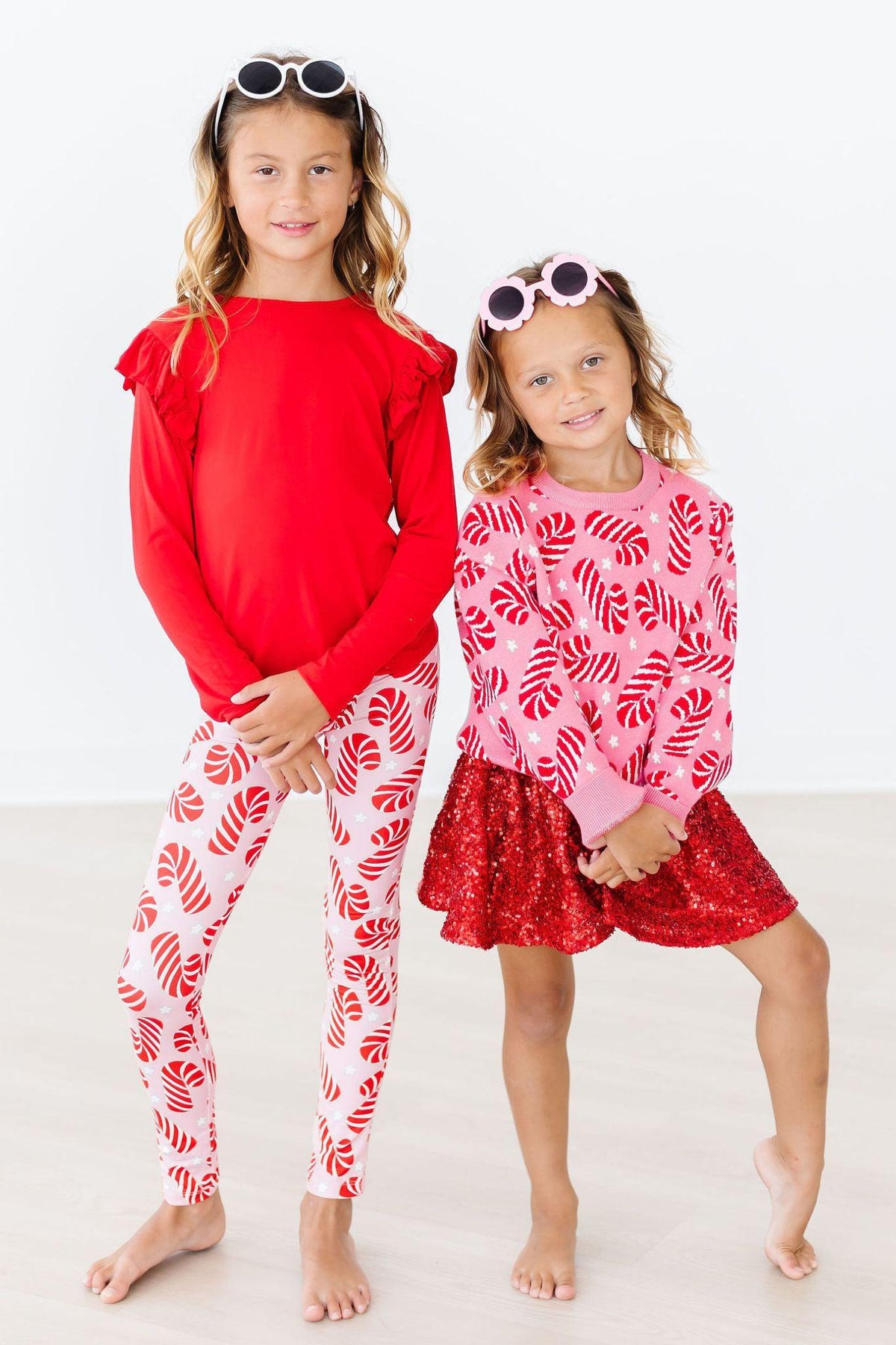 Mila & Rose Candy Canes Leggings. Soft, festive red & white striped baby pants.