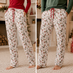 Adult pajama pants with a Western-themed Christmas print and elastic waistband