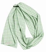 Green gingham ring sling baby carrier with black aluminum rings and long cotton blend tail