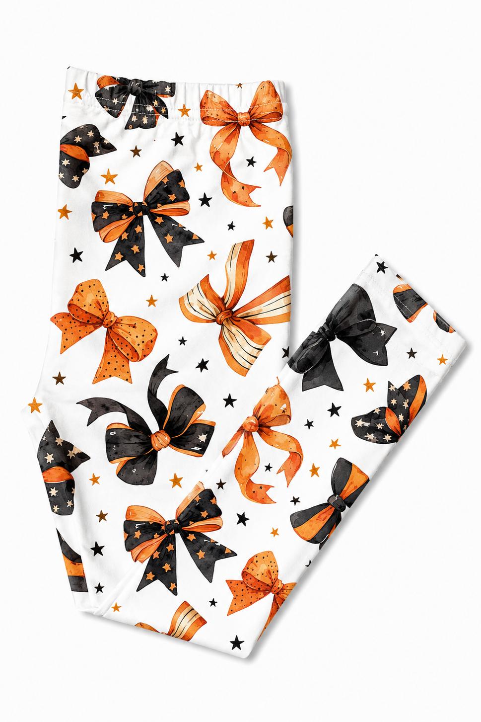 Trick or Twirl Halloween-themed girls' leggings with a high waist and slim leg fit