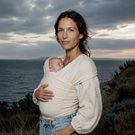 Baby K'tan wrap-style baby carrier in natural cream cotton with double-loop design and no buckles