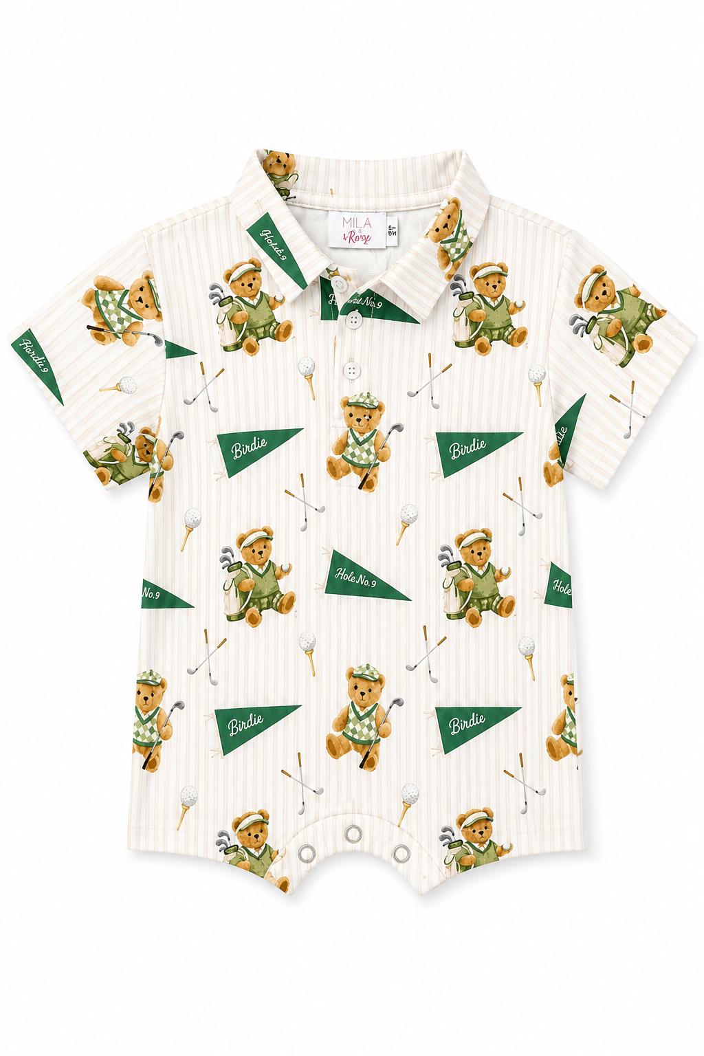Baby shorty one-piece with polo collar and a golfing bears print on the green