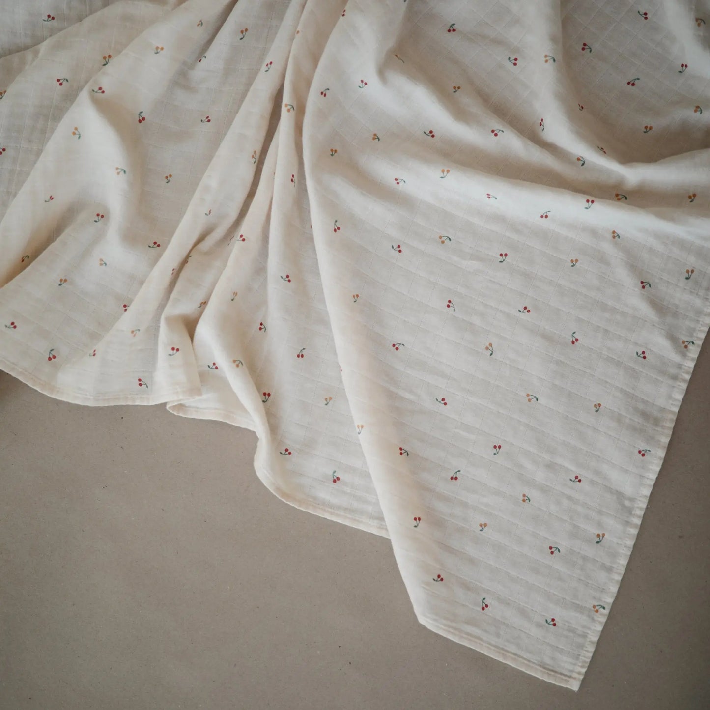Organic Cotton Muslin Swaddle Blanket for Baby Cuddling and Nursing Mushie