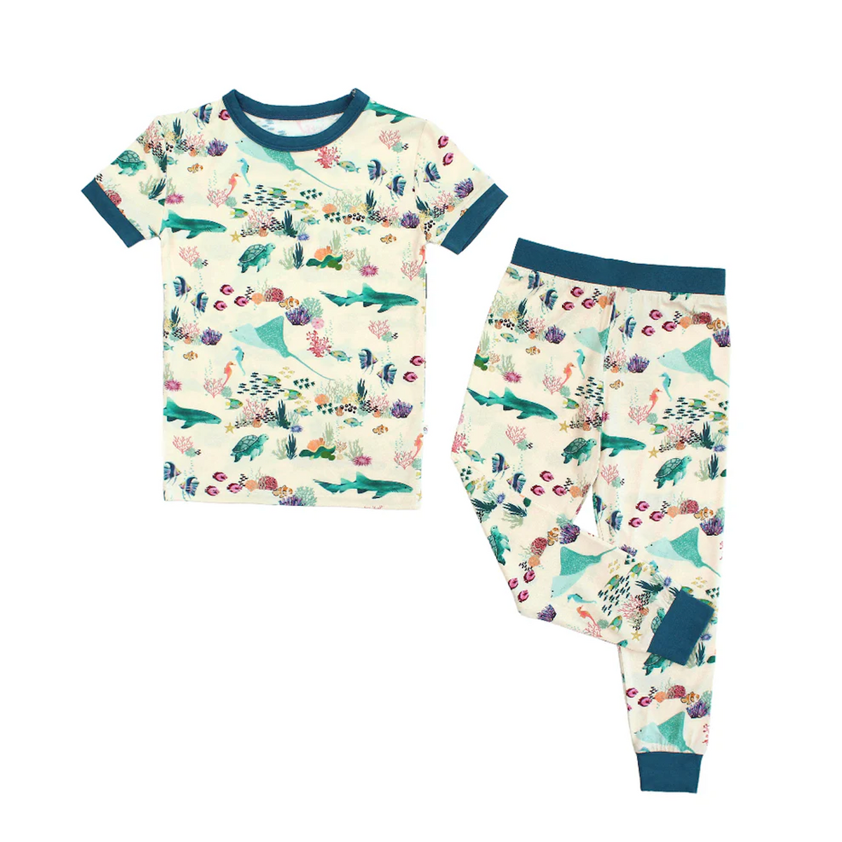 Baby pajamas in a Coral Reef ocean print with sea creatures on a light background