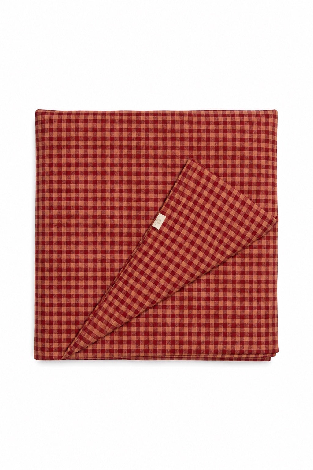 Quilted crib blanket in red and beige, hand-tufted with padding