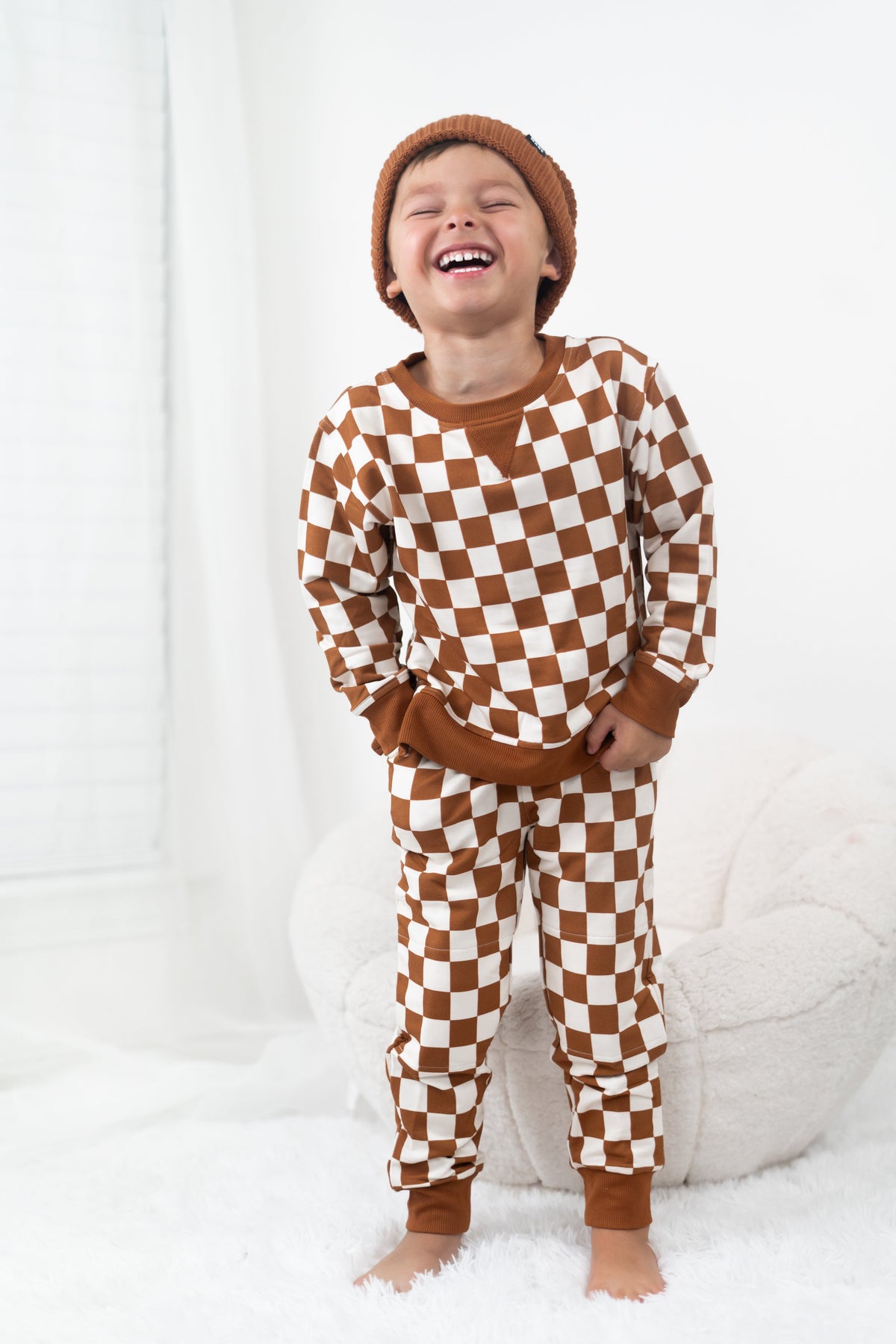 DREAM BIG LITTLE CO copper checkers baby pullover, soft organic cotton.