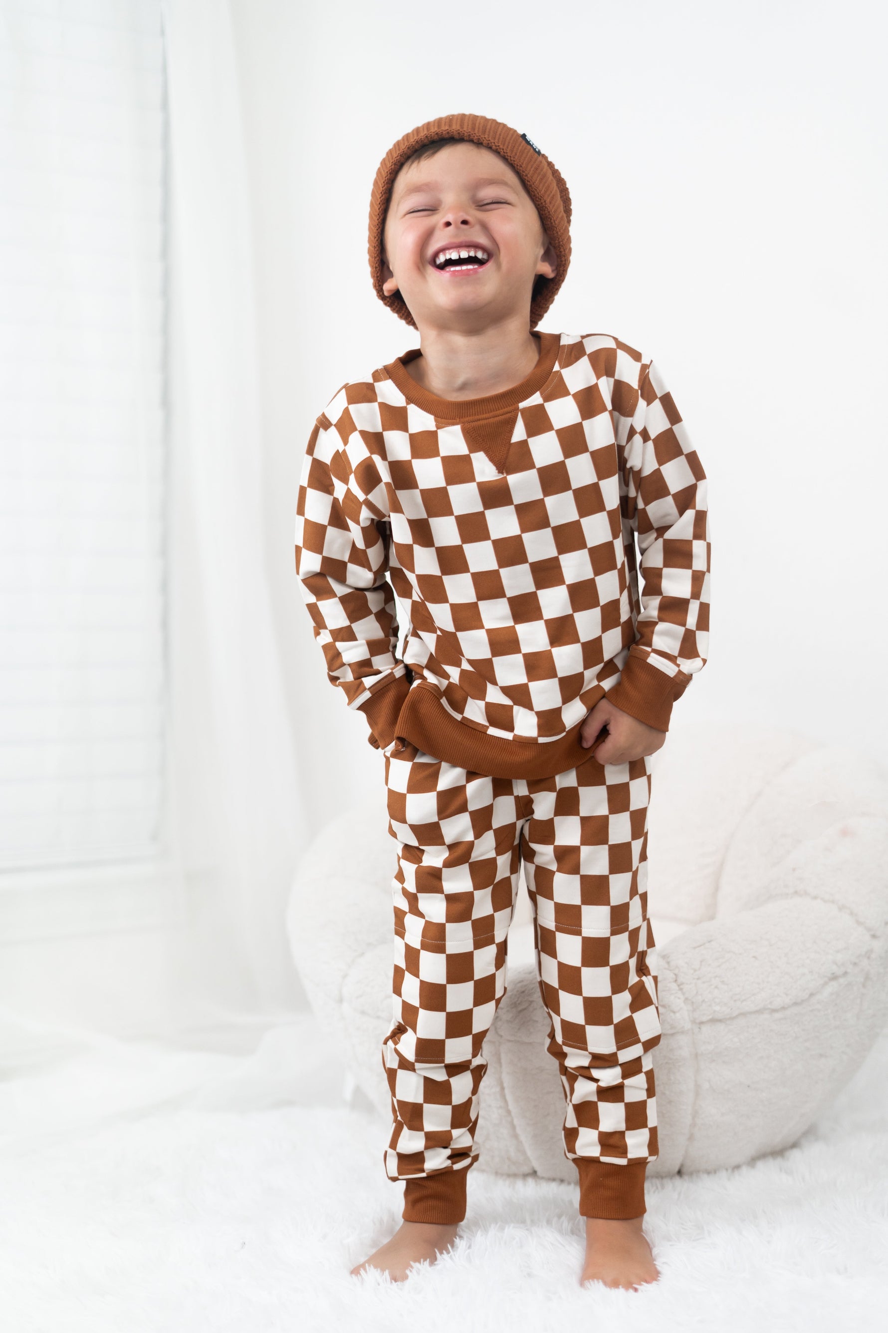 DREAM BIG LITTLE CO copper checkers baby pullover, soft organic cotton.
