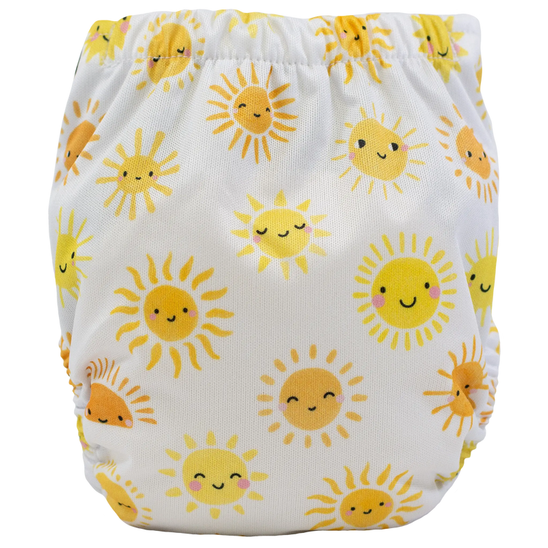 Tiny Tushies Newborn AIO Cloth Diaper with sun pattern, fits 5-20 lbs, recycled PUL material.