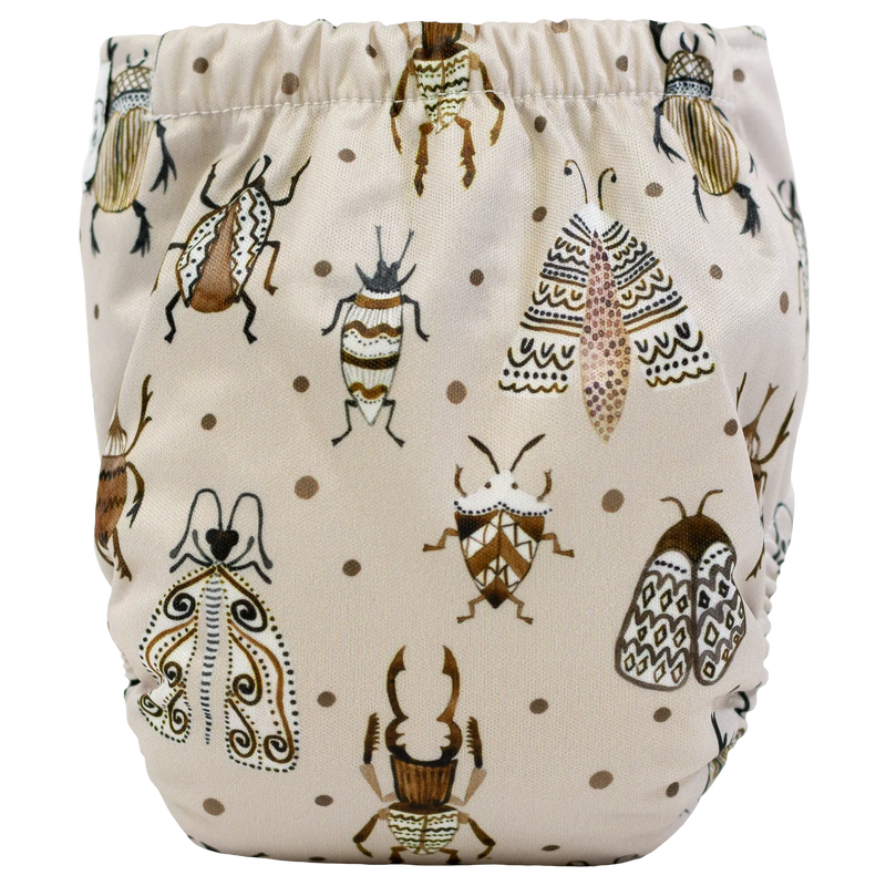 Tiny Tushies Newborn AIO Cloth Diaper with insect print design.