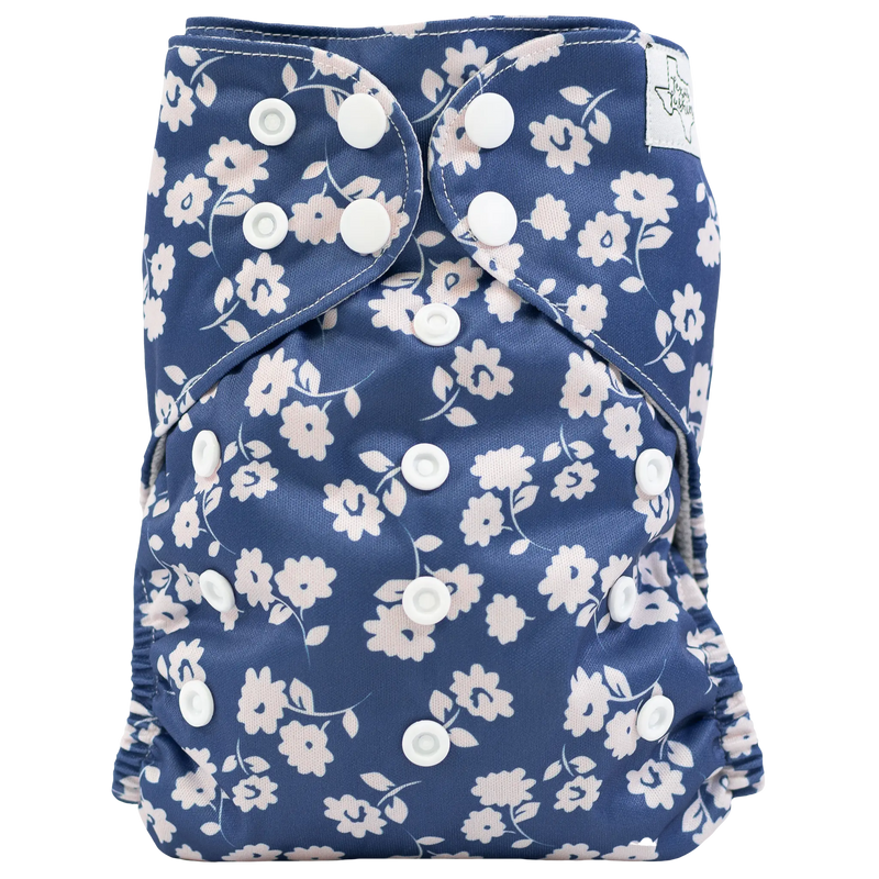 Slim Fit AIO Cloth Diaper with floral print and simplified snaps for babies 8-40 lbs.