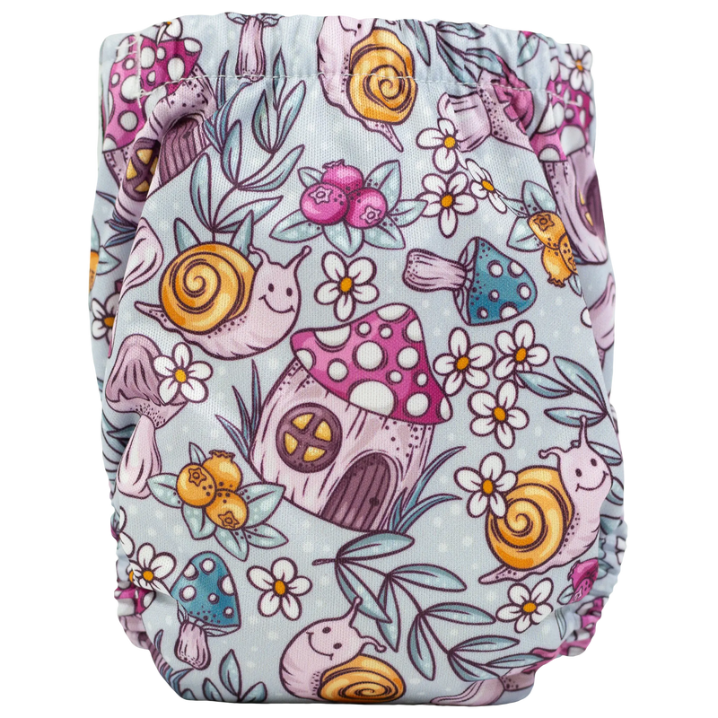 Tiny Tushies Newborn AIO Cloth Diaper with whimsical snail and mushroom design.