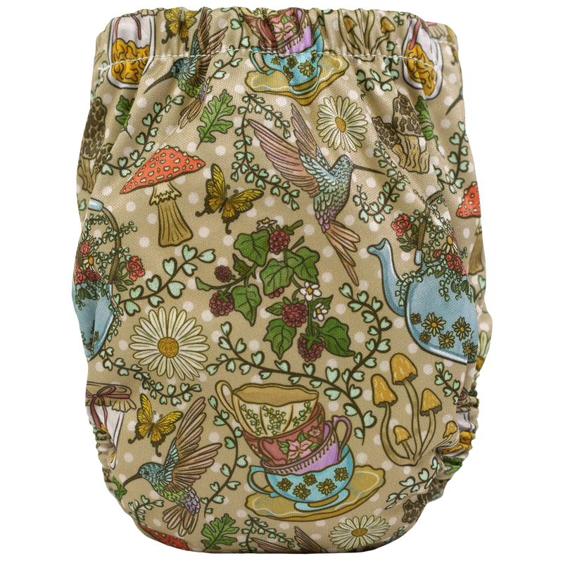 Tiny Tushies Newborn AIO Cloth Diaper with whimsical garden print.