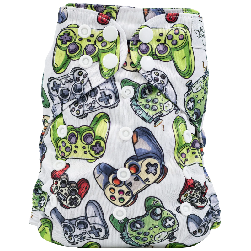 Slim Fit Pocket Cloth Diaper with colorful controller design, adjustable snaps, and recycled PUL material.