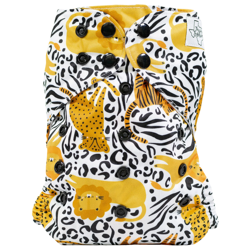 Slim fit pocket cloth diaper with animal print design and adjustable snap closures.