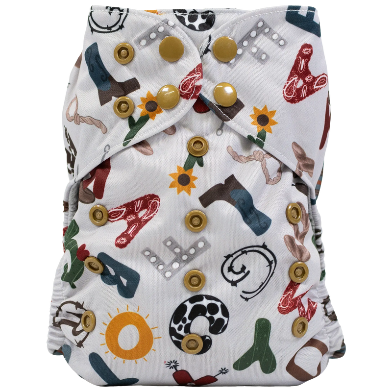 Slim Fit AIO Cloth Diaper with colorful print and secure snaps for babies 8-40lbs.