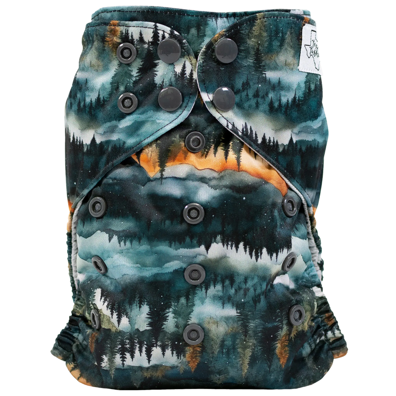 Slim Fit AIO Cloth Diaper with forest print, adjustable snaps, and moisture-wicking jersey material.