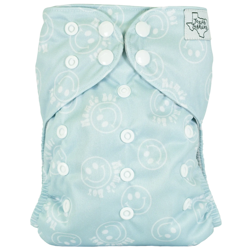 Slim Fit Pocket Cloth Diaper, light blue with smiley face design, white snaps, designed for 8-40lbs babies.