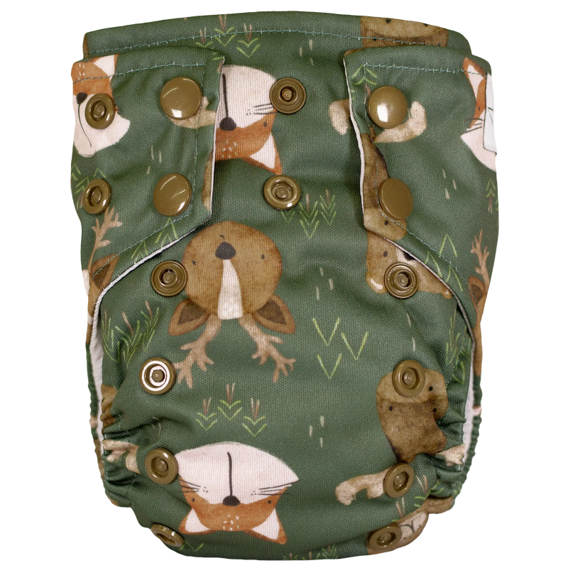 Tiny Tushies Newborn AIO Cloth Diaper with animal print and adjustable snaps.