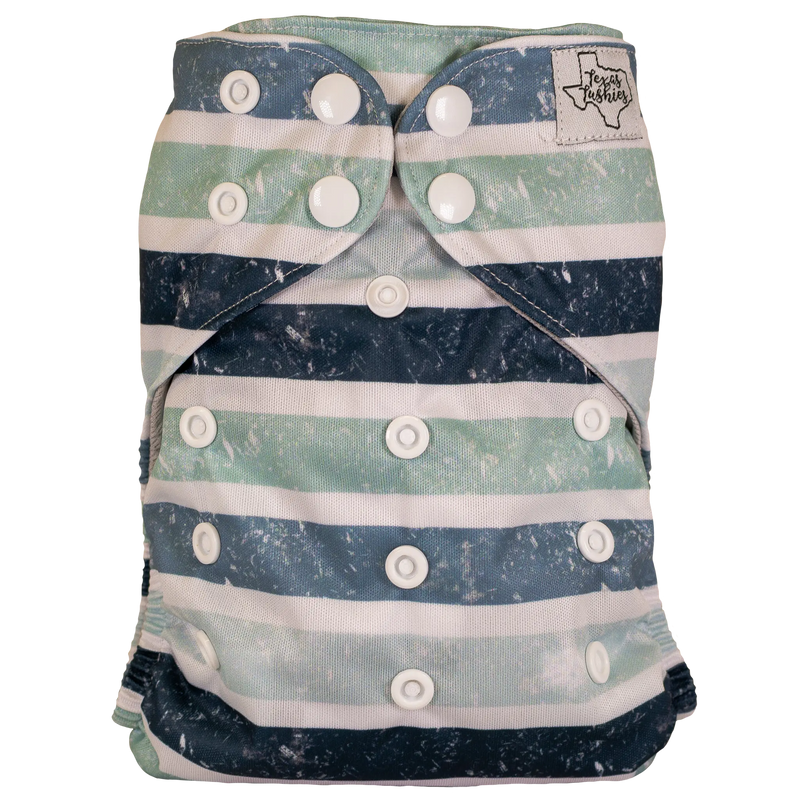Slim Fit AIO Cloth Diaper with striped pattern and snap closures.