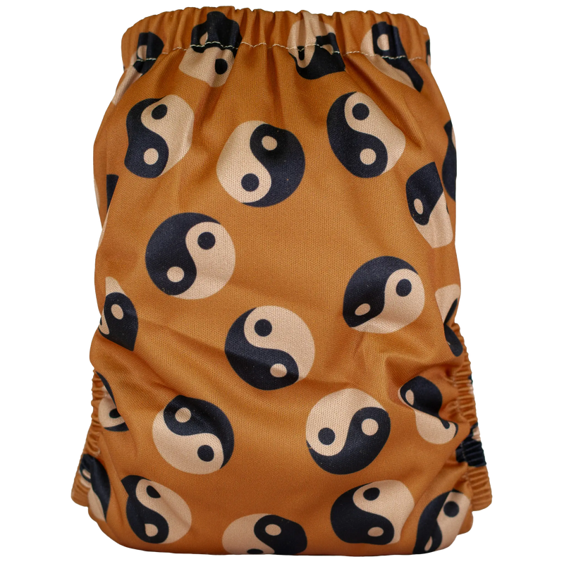 Slim fit pocket cloth diaper with yin-yang print design.