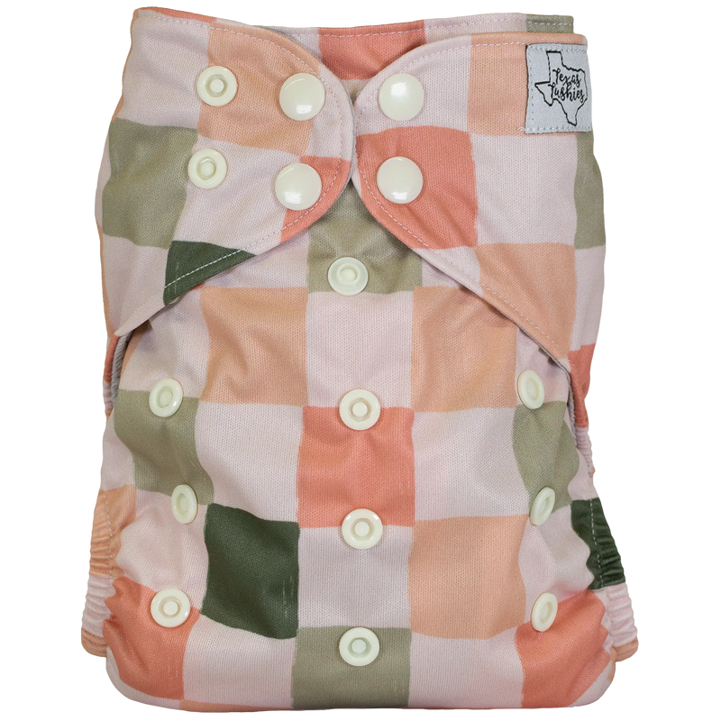 Slim Fit AIO Cloth Diaper with colorful checkered pattern and adjustable snaps.