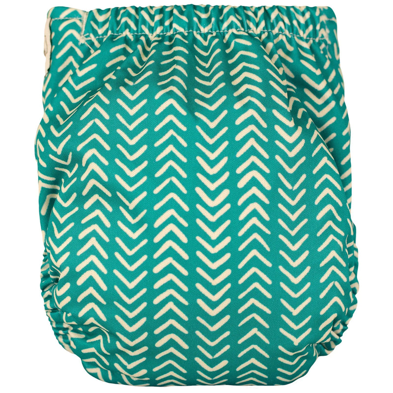 Tiny Tushies Newborn AIO Cloth Diaper with green arrow pattern.