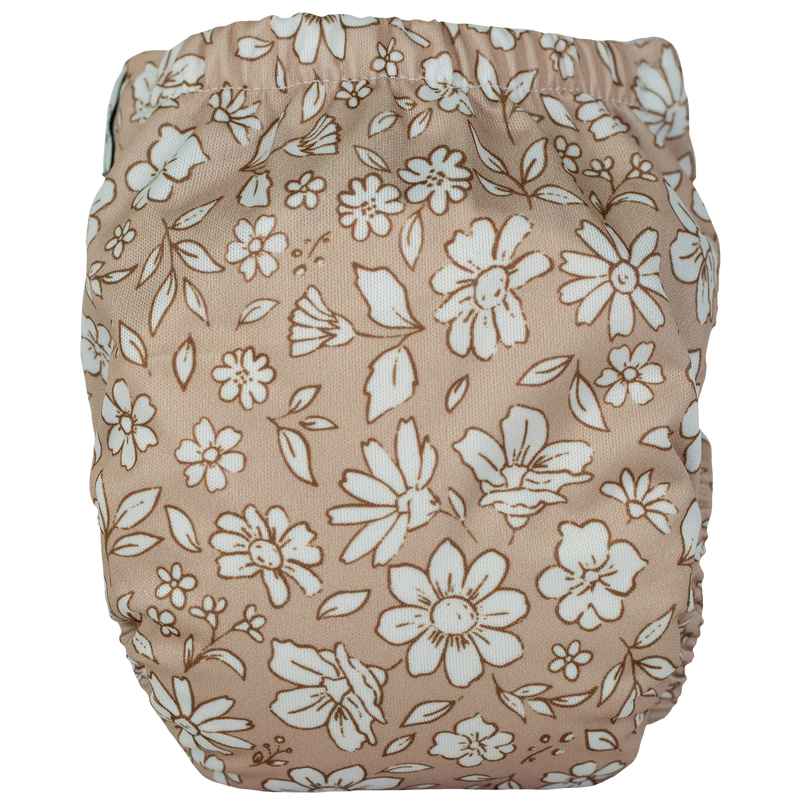 Tiny Tushies Newborn AIO Cloth Diaper with floral pattern