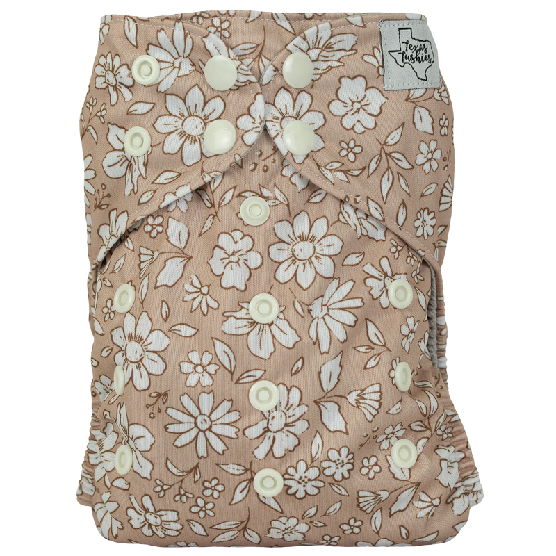 Slim Fit AIO Cloth Diaper with floral pattern and adjustable snaps.