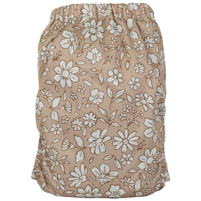 Slim Fit AIO Cloth Diaper with floral print design, athletic wicking jersey, and adjustable snaps for 8-40lbs.