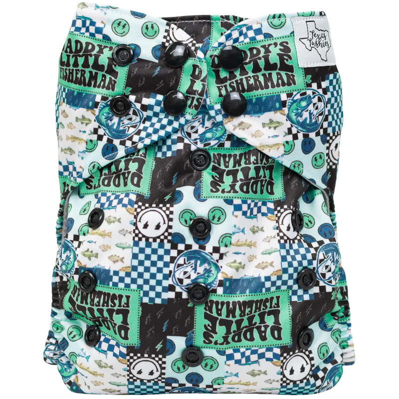 Slim Fit AIO cloth diaper with colorful fishing-themed print and simplified snap closures.