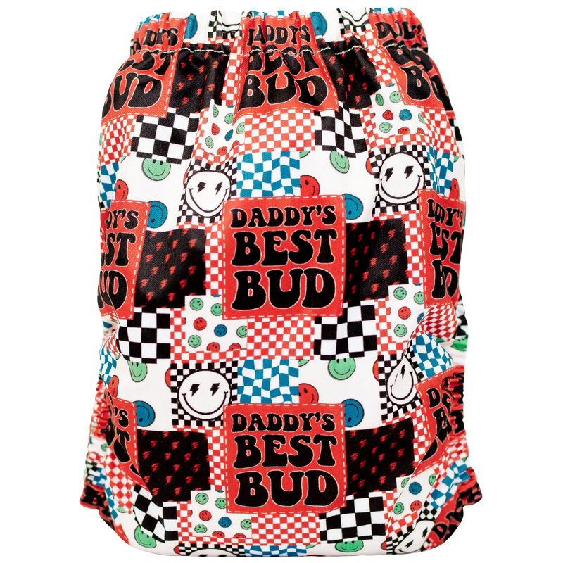 Colorful slim fit pocket cloth diaper featuring playful patterns and "Daddy's Best Bud" text.