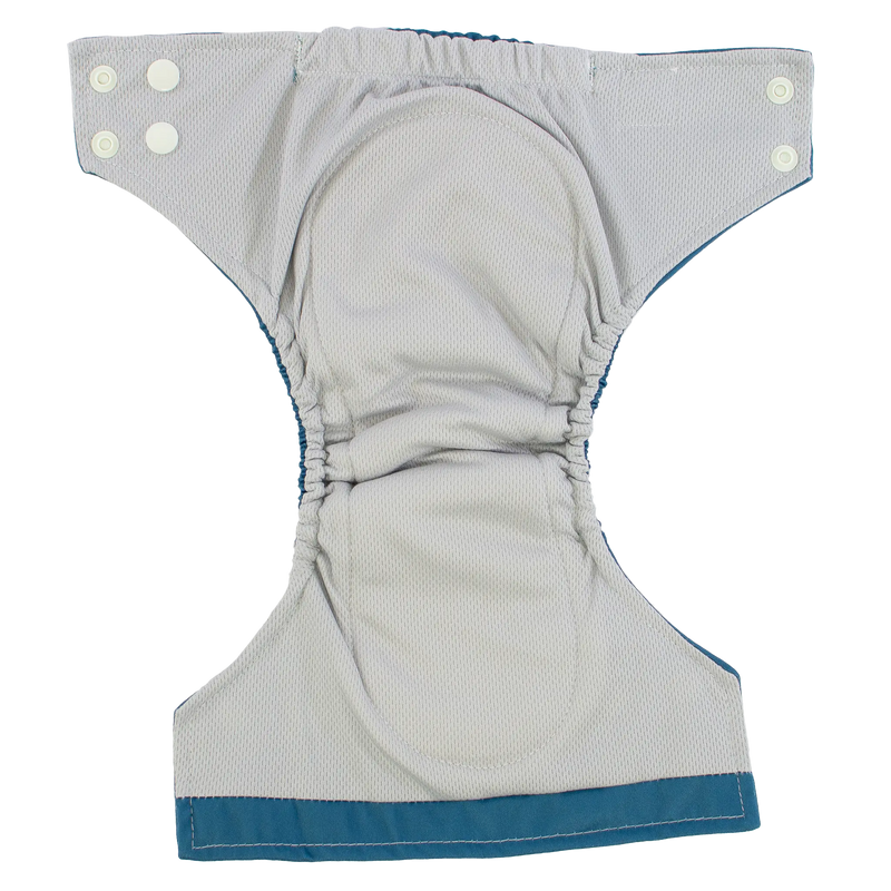 Tiny Tushies Newborn AIO Cloth Diaper with snaps and pocket opening.