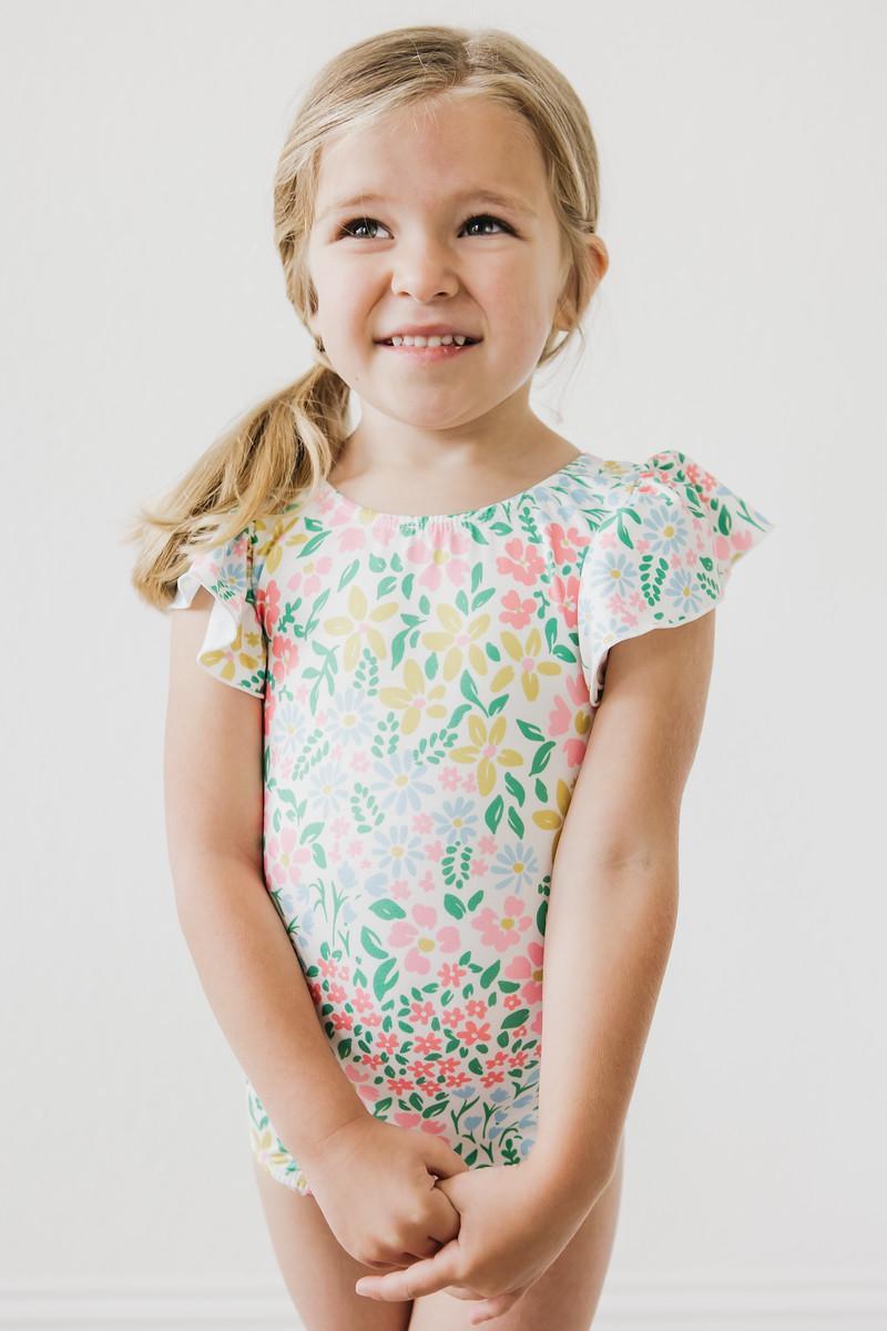 Mila & Rose Daffodils print short sleeve flutter leotard for baby or toddler, front view.