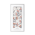 Bamboo muslin swaddle blanket with a pink dahlia floral pattern spread out flat