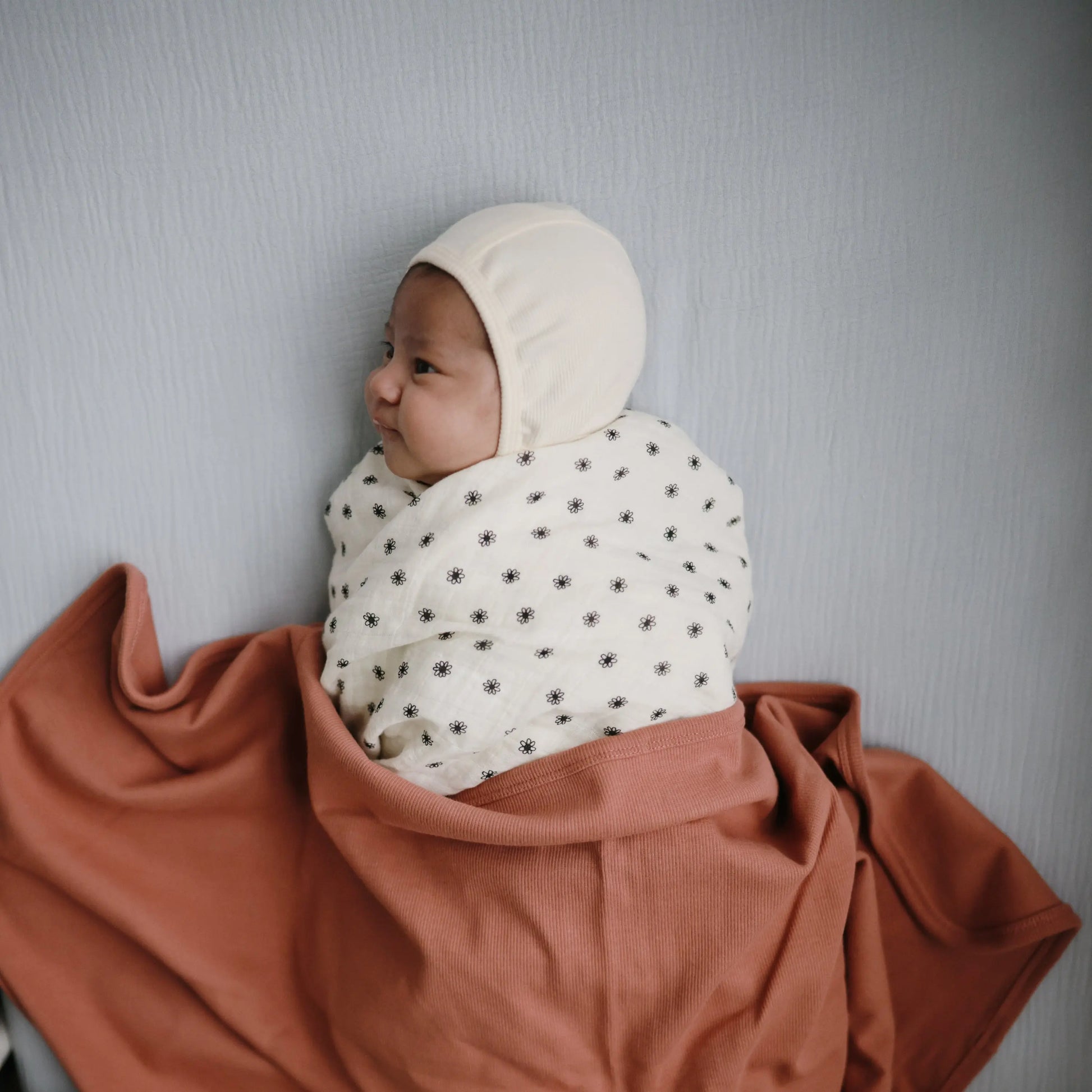 Organic Cotton Muslin Swaddle Blanket for Baby Cuddling and Nursing Mushie