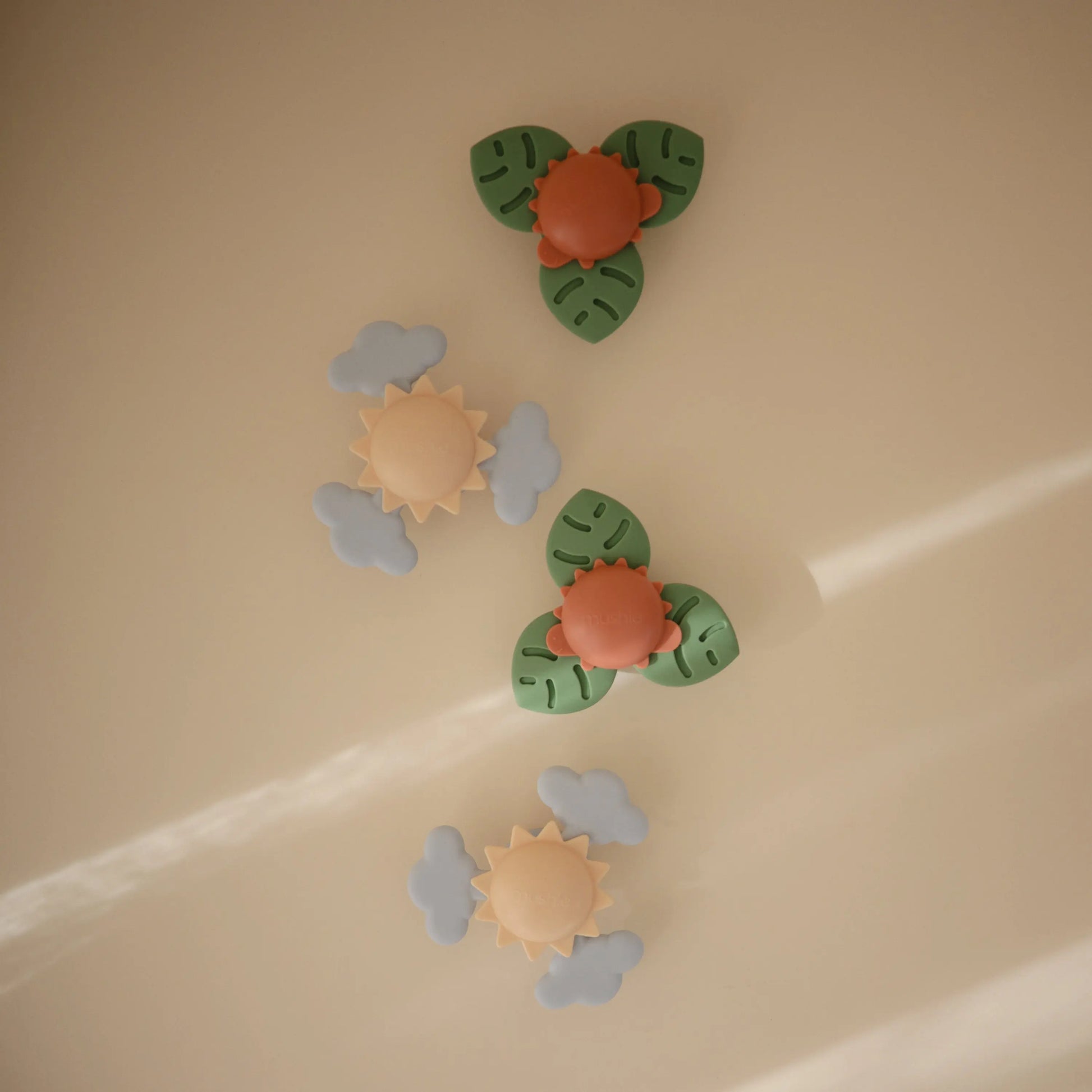 Dino Suction Spinner Toy for Kids with 100 Percent Food Grade Silicone Leaves Mushie Everetts Place: Online Boutique