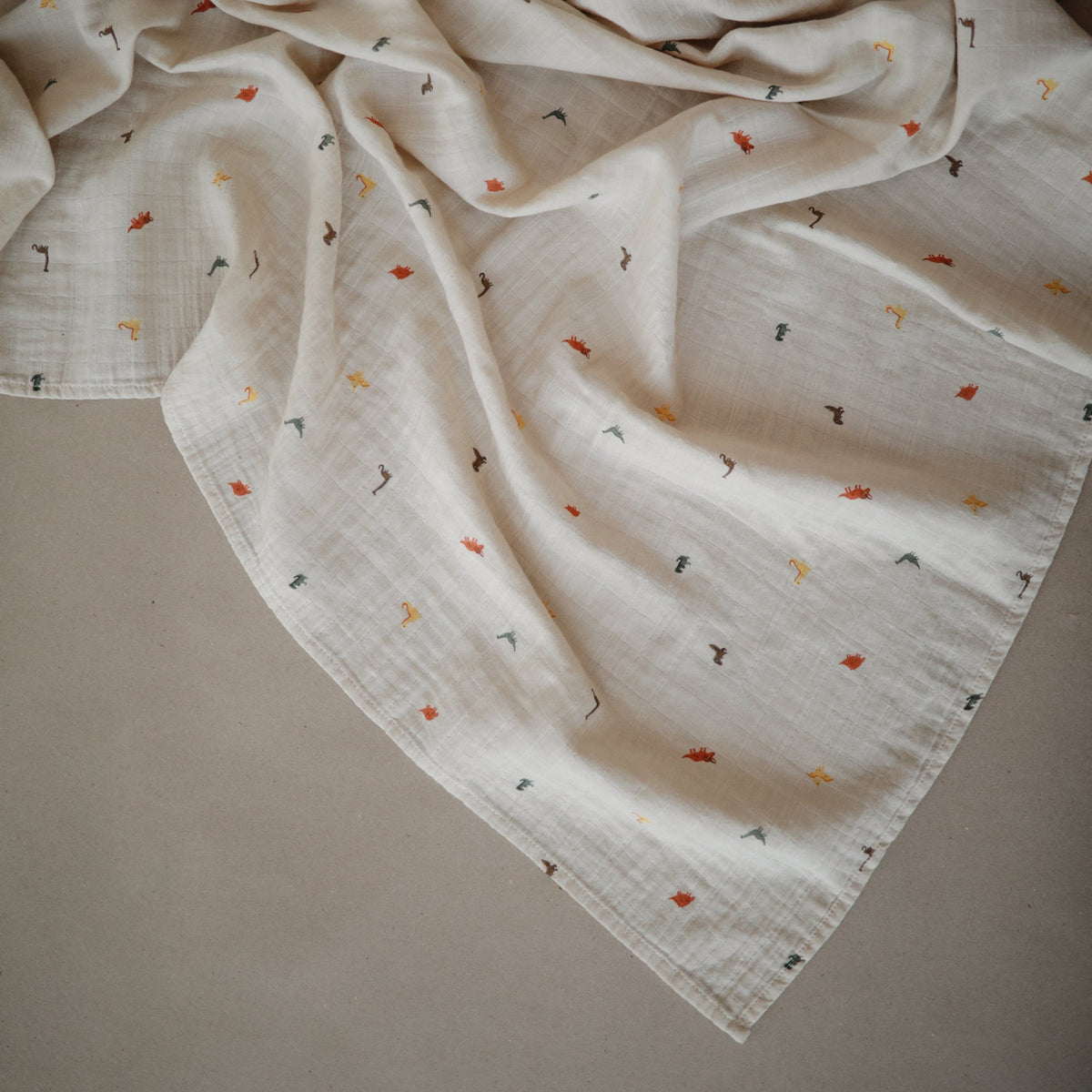 Mushie organic cotton muslin swaddle blanket, soft and breathable