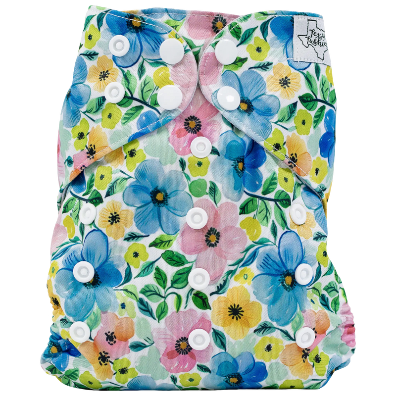 Slim Fit AIO Cloth Diaper with floral print, adjustable snaps, and recycled PUL material.