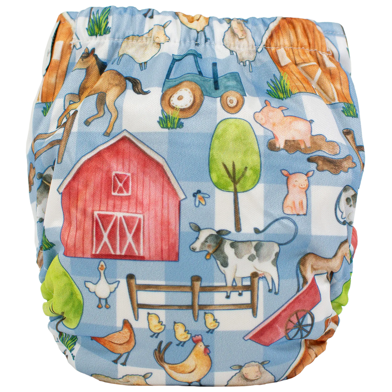 Tiny Tushies Newborn AIO Cloth Diaper with farm animal print, waterproof material.